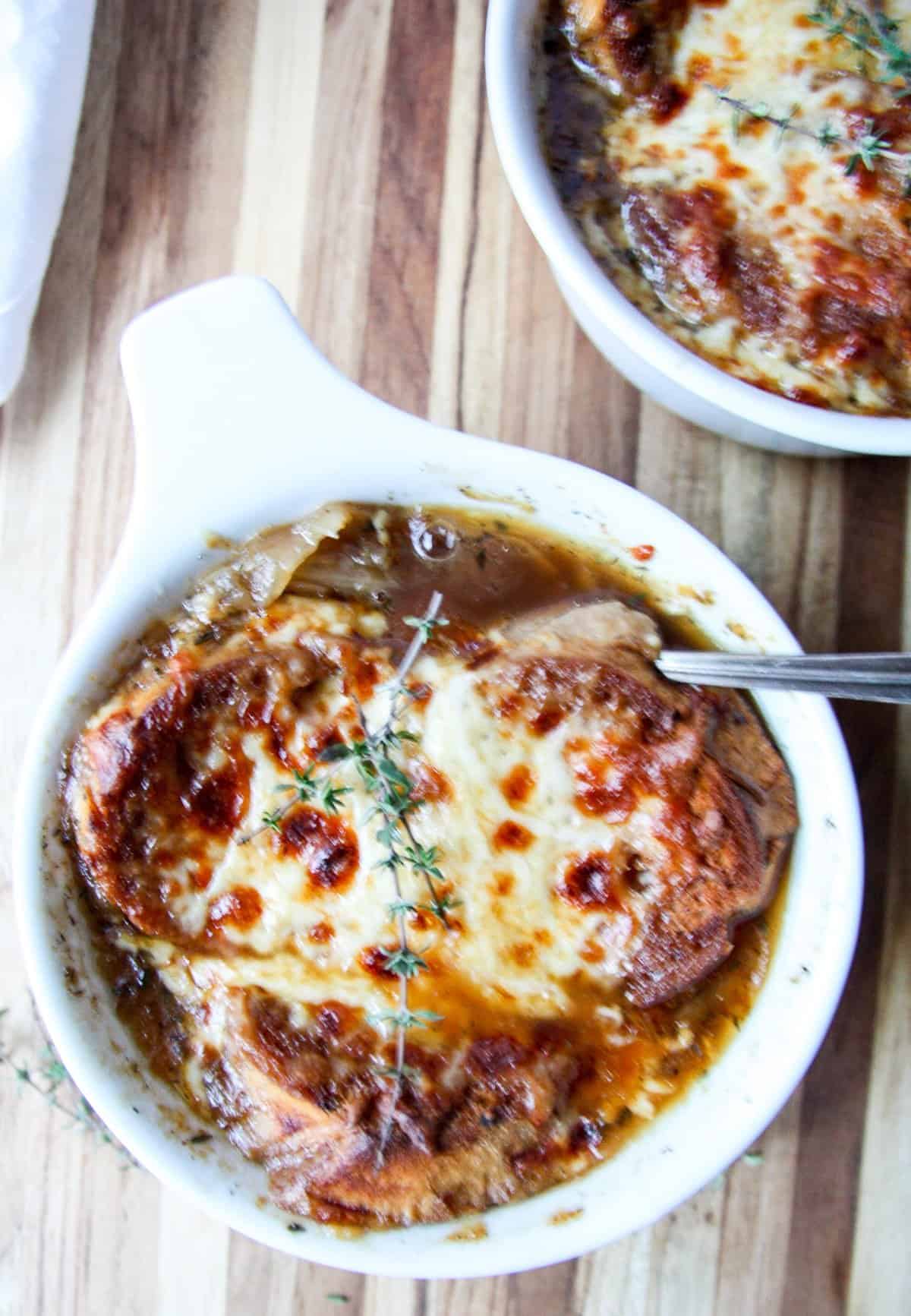 French Onion Soup in a White Bowl with a spoon