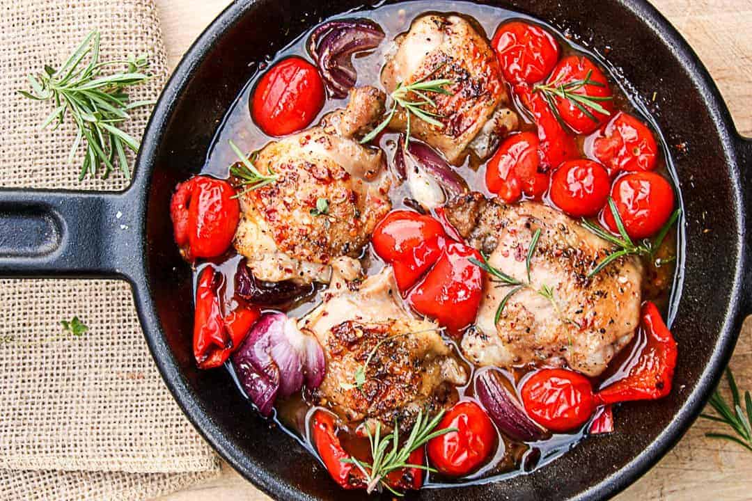 Grilled Chicken & Vegetables in Red Currant Sauce in a cast iron skillet