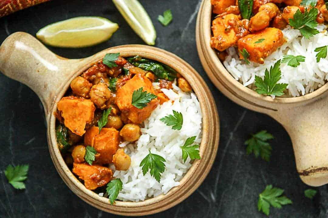 Two bowls of sweet potato chickpea curry.
