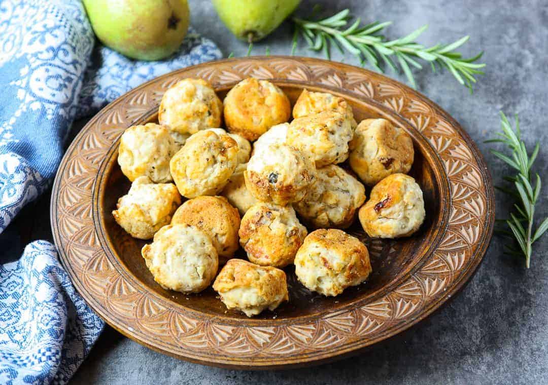 A plate of mini muffins on a table