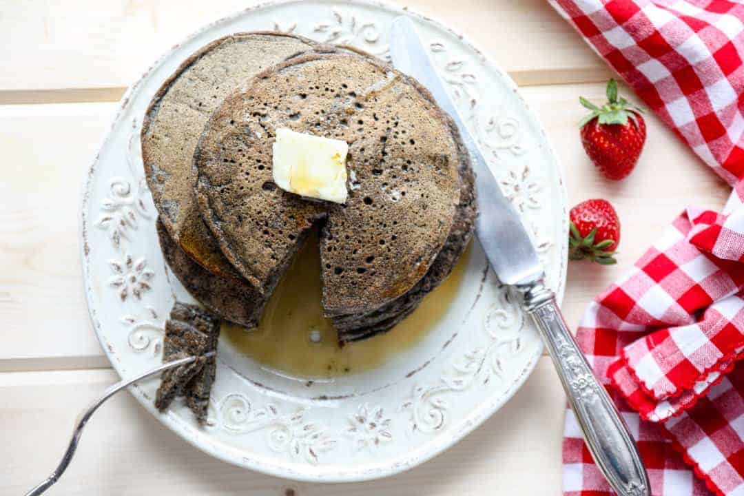 Pancakes on a plate with a knife & fork