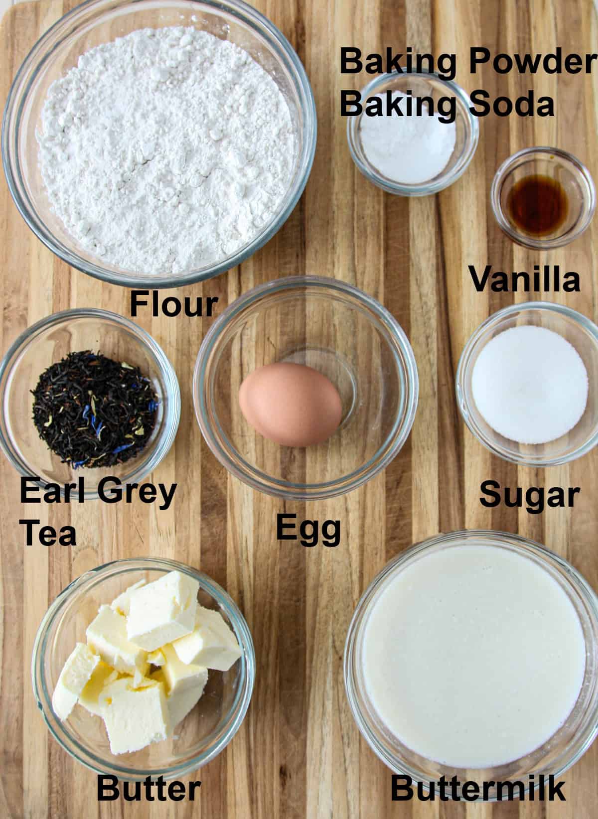 The ingredients for making the scones, in glass bowls.