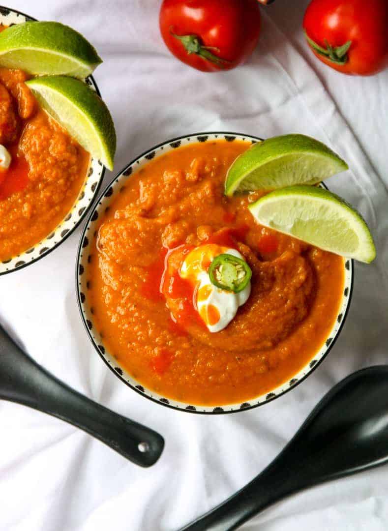 A bowl of soup with a spoon