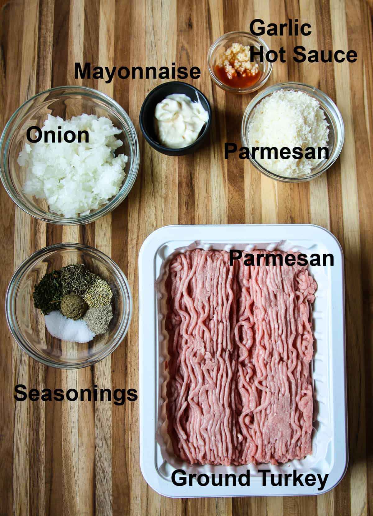 The ingredients to make the recipe assembled on a wooden board.