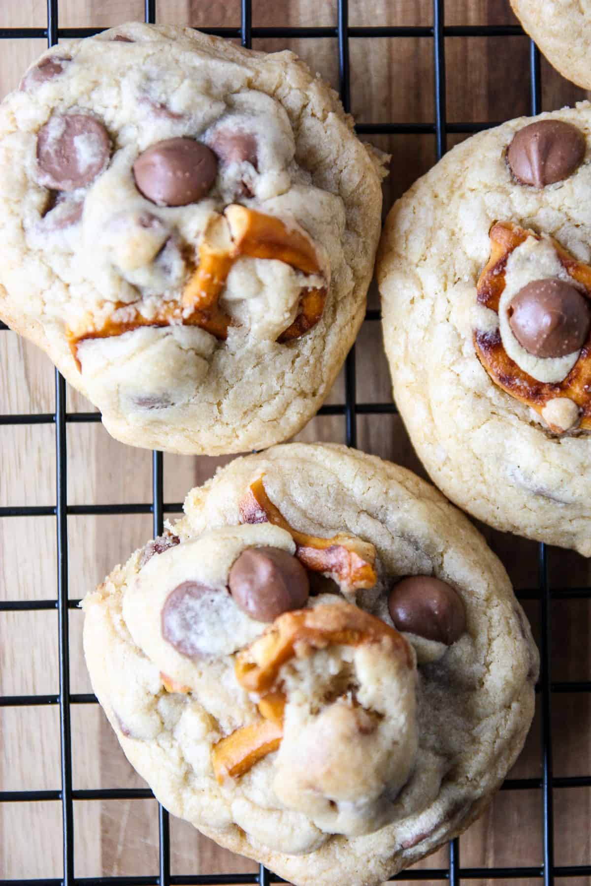 Pretzel cookies cooling on a wire rack.