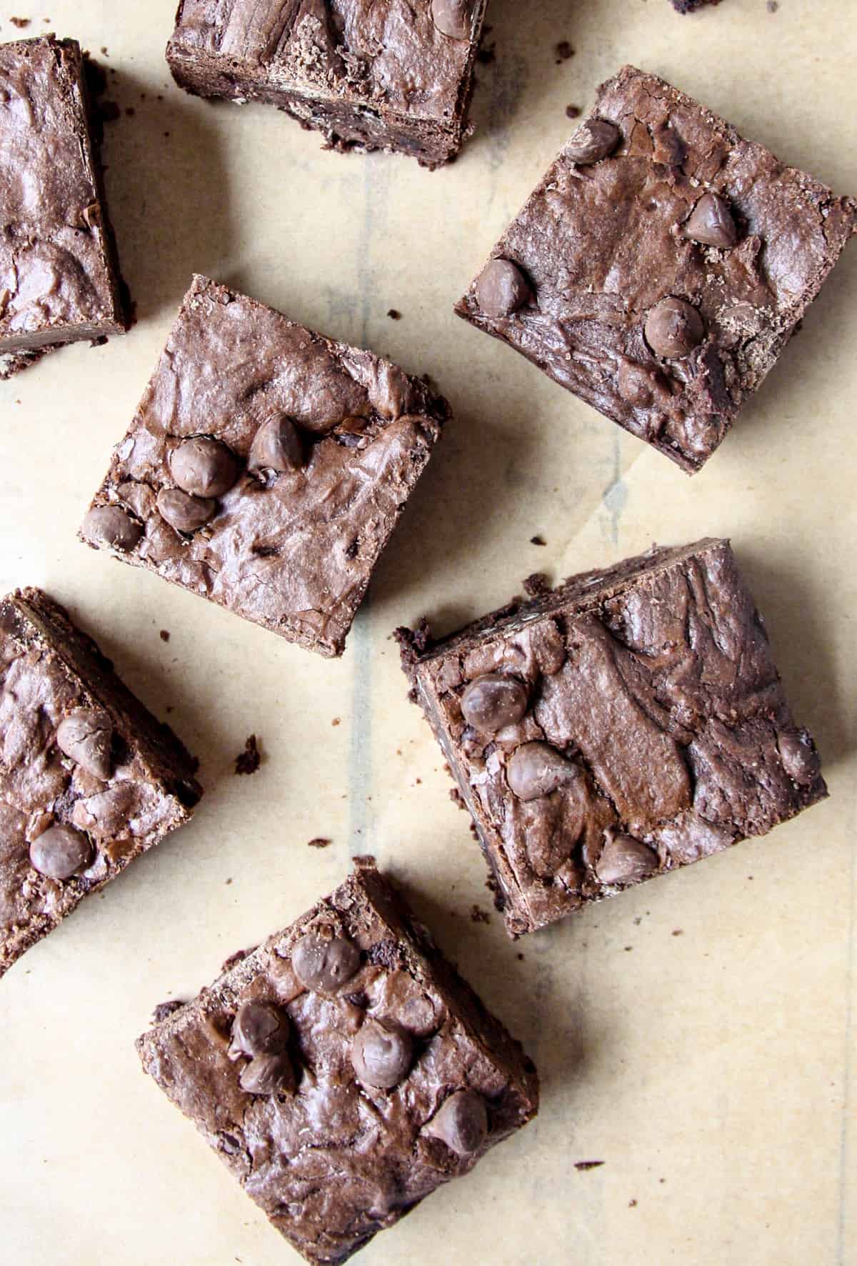 6 Mexican chocolate brownies on parchment paper.