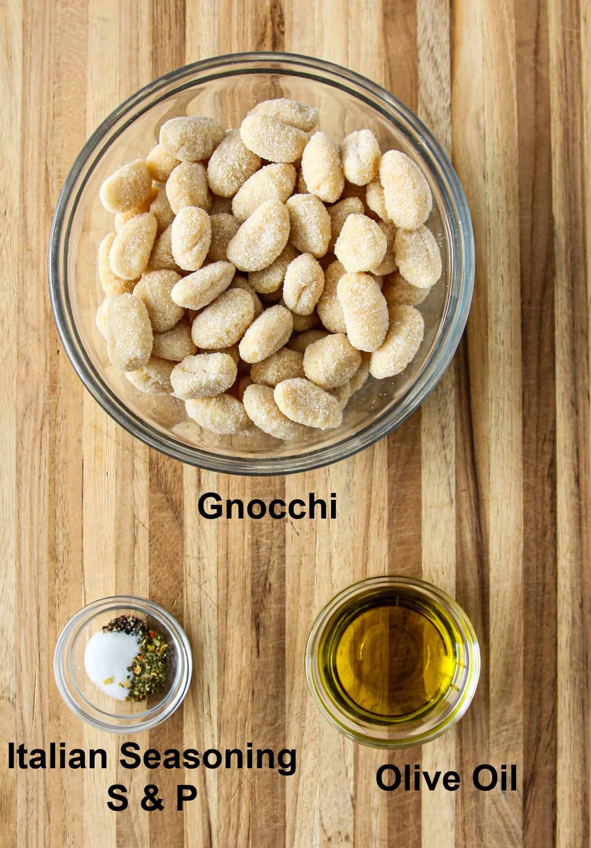 Place the ingredients for making this recipe in a glass bowl on a wooden board.